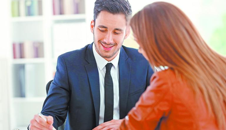 Woman,Meeting,Financial,Adviser,In,Office